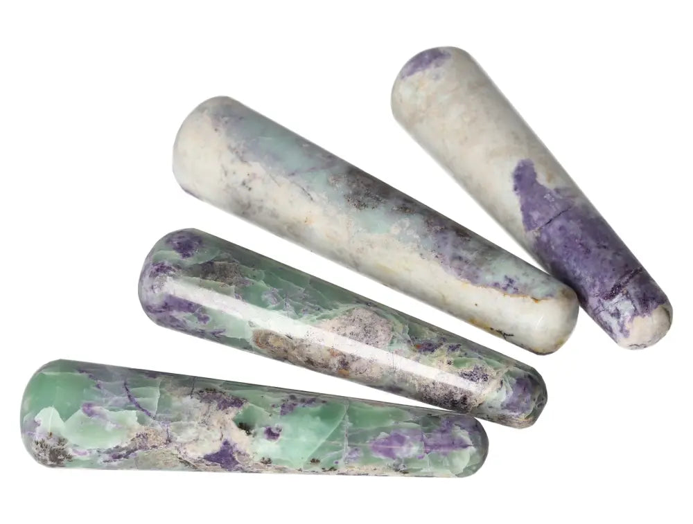 Four Bolivianite wands with a mix of green and purple hues, ideal for crystal healing and energy balancing.