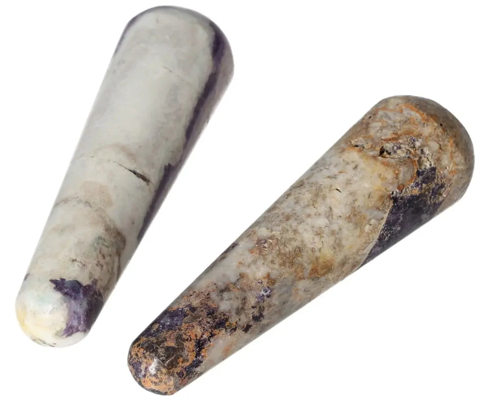 Pair of smooth Bolivianite wands featuring natural purple and beige hues, ideal for meditation and crystal healing practices.
