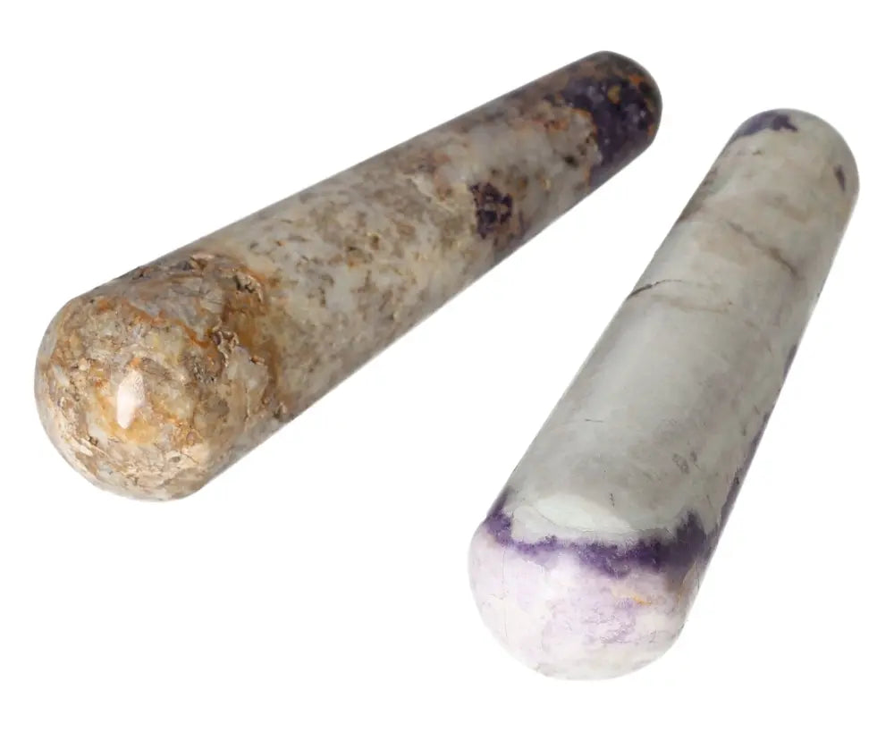 Two polished Bolivianite wands with unique marbling, perfect for energy healing and crystal collections.