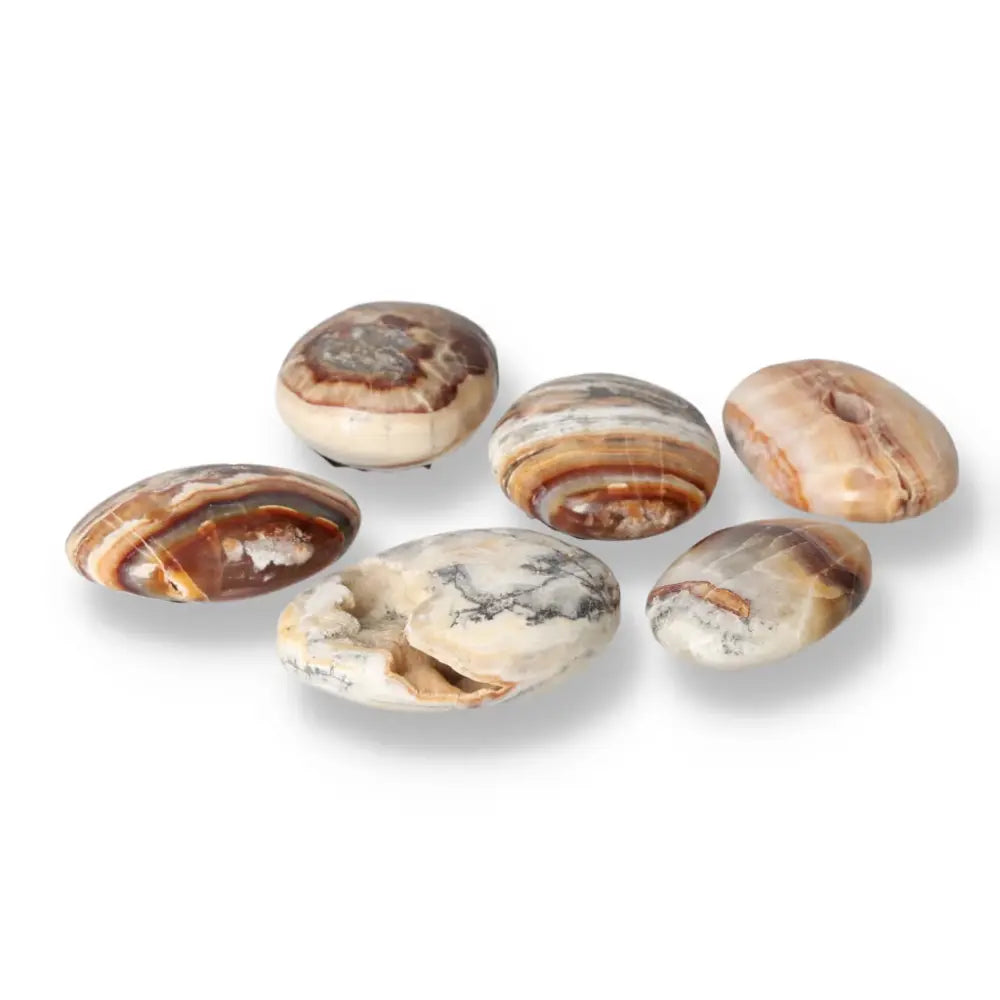 Brown Aragonite Palm Stones displaying natural earthy tones, ideal for meditation and stress relief, enhancing any crystal collection.