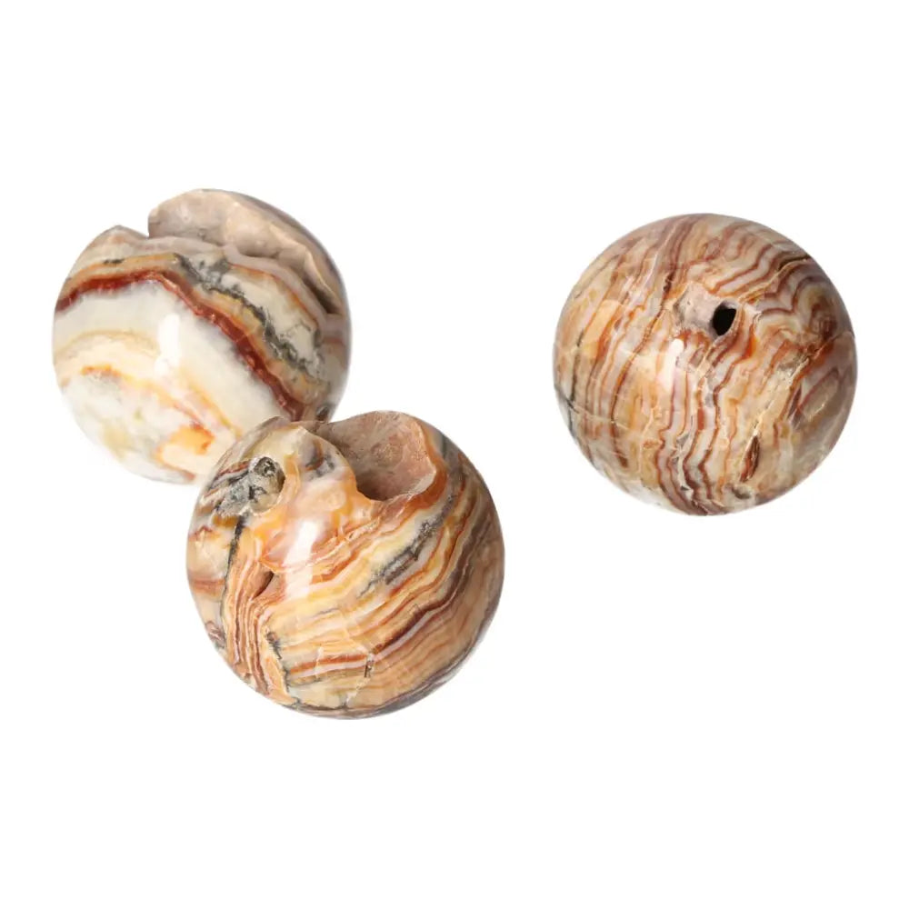 Brown Aragonite spheres showcasing unique earthy tones and intricate crystal formations, ideal for grounding and emotional healing.