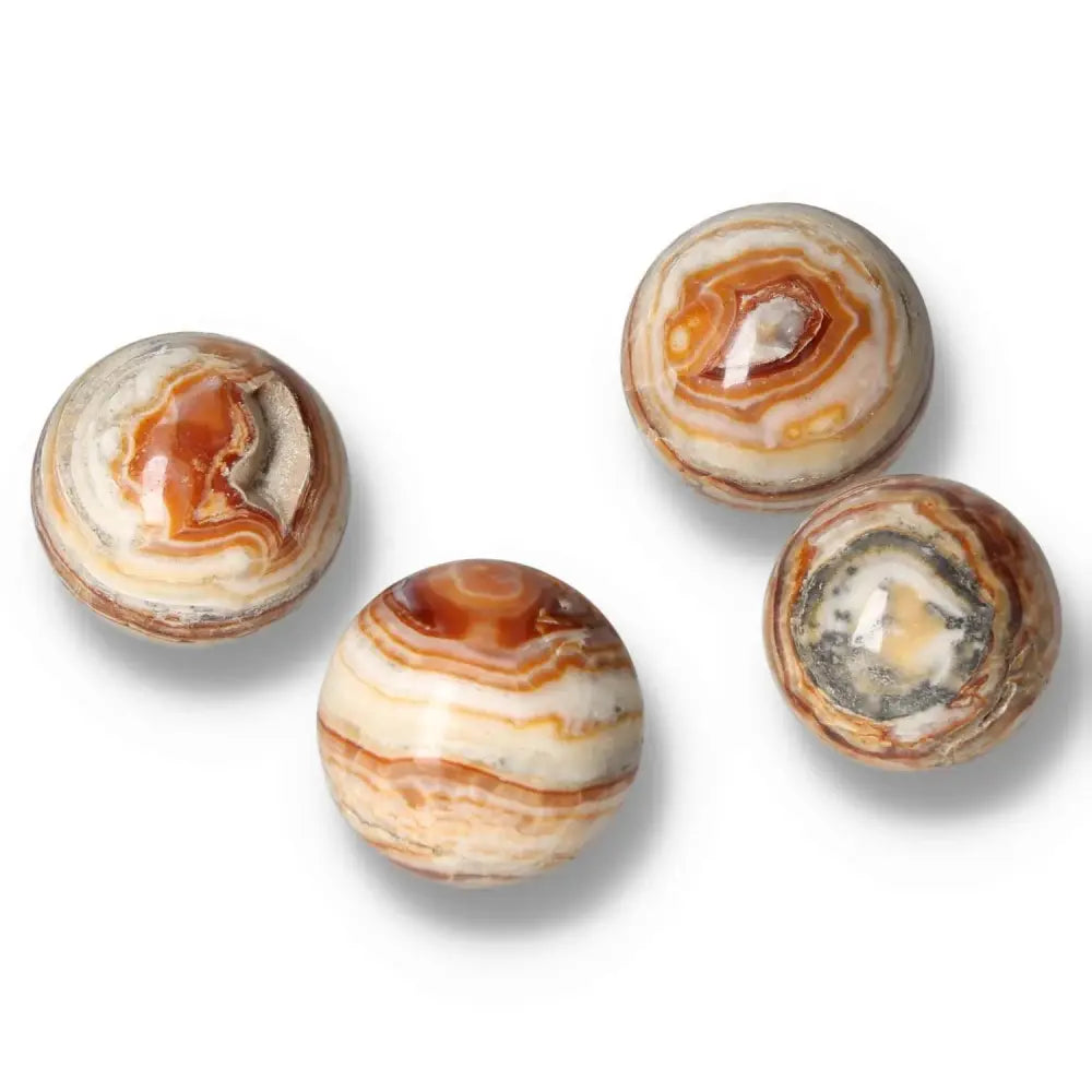 Brown Aragonite Spheres showcasing earthy tones and intricate crystal formations for stability and emotional healing.