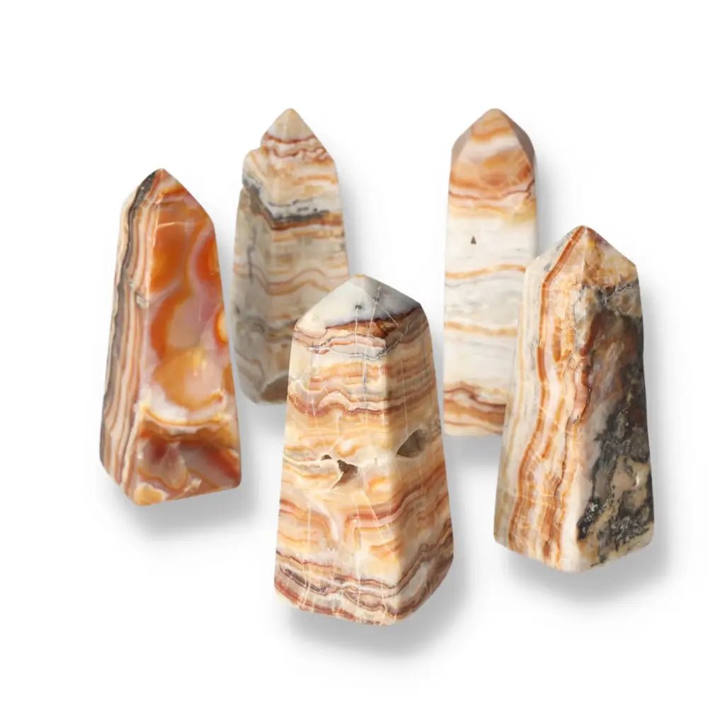 Brown Aragonite Tower crystals showcasing earthy tones and natural beauty for grounding energy and metaphysical benefits.