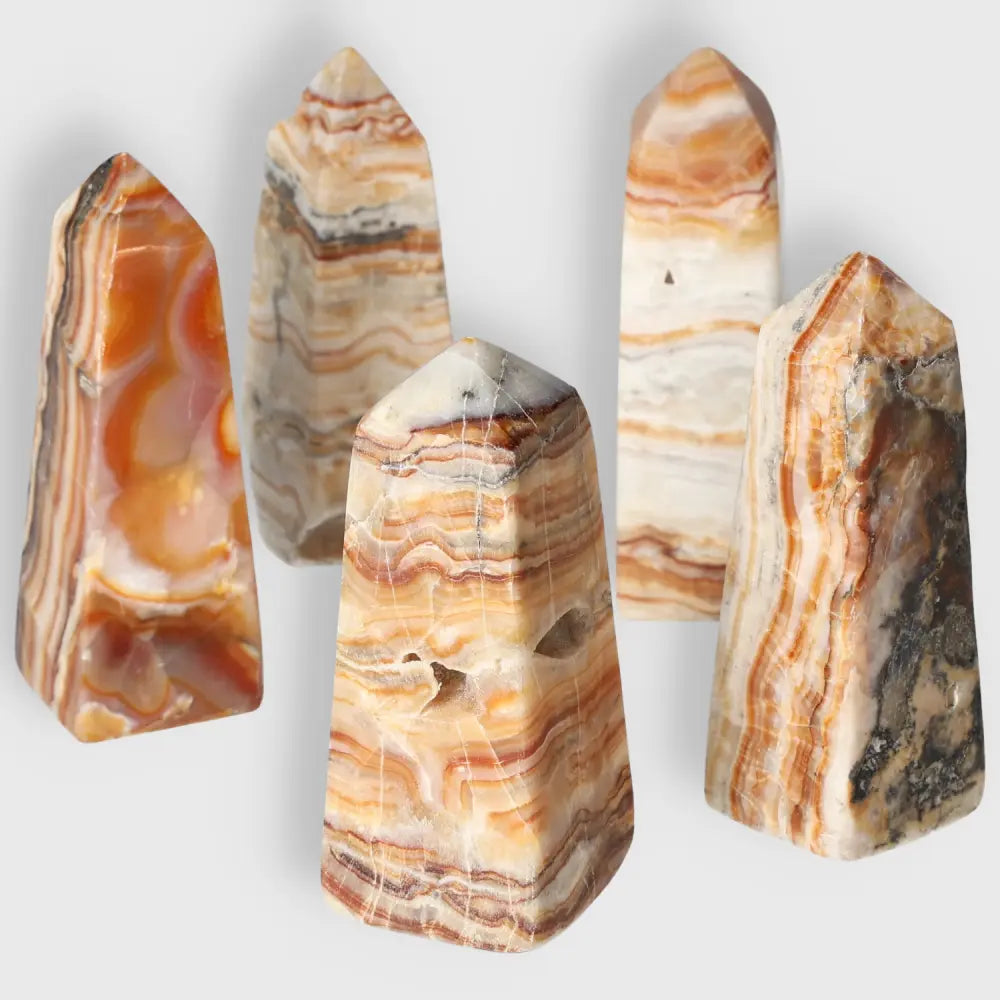 Brown Aragonite Tower M crystals with earthy tones and natural beauty, ideal for grounding energy and enhancing your space.