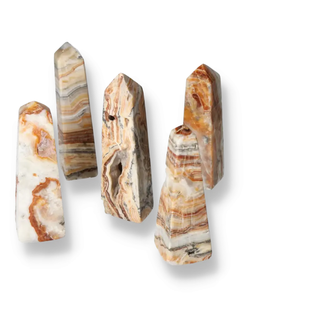 Five Brown Aragonite Towers showcasing rich earthy tones and natural patterns, ideal for enhancing space with grounding energy.