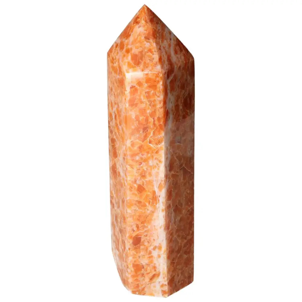 Calcite Orchid crystal tower from Sylvia Crystals, enhancing self-confidence and spiritual growth with luxury and motivation benefits.