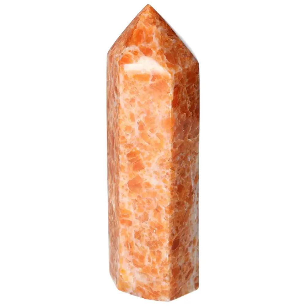 Calcite Orchid crystal tower from Sylvia Crystals, enhancing self-confidence and spiritual growth with luxury and unique energy.