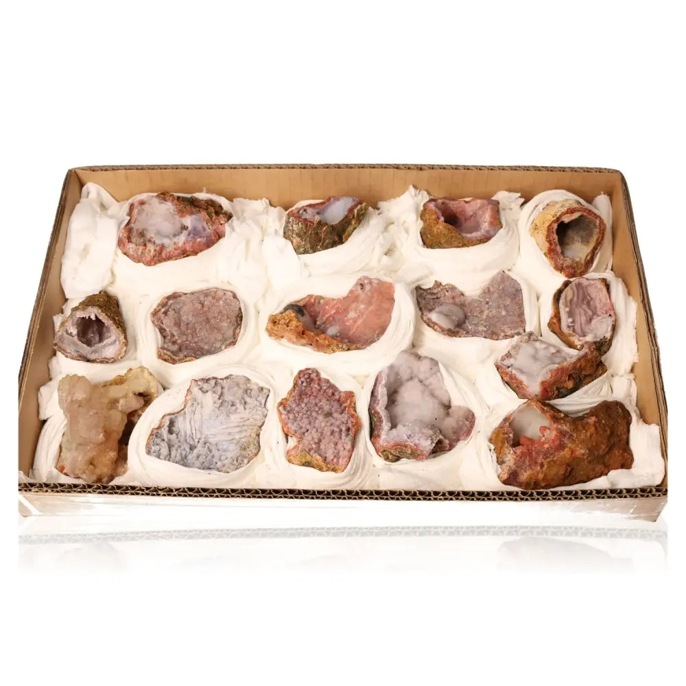 Box of medium calcite stalactite druzy crystals, ideal for workspace energy clearing and personal growth, boosting motivation and memory.