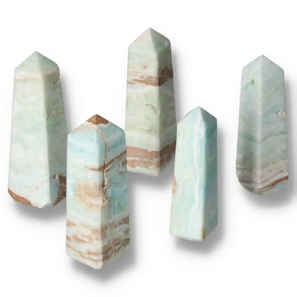Caribbean Calcite Towers showcasing calming blue and white hues, embodying oceanic tranquility and spiritual balance.