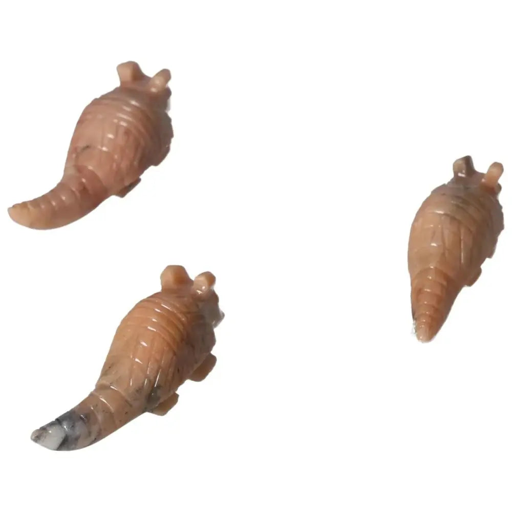 Carved Dolomite Armadillo trio from Sylvia Crystals, hand-carved for emotional healing and spiritual elegance.