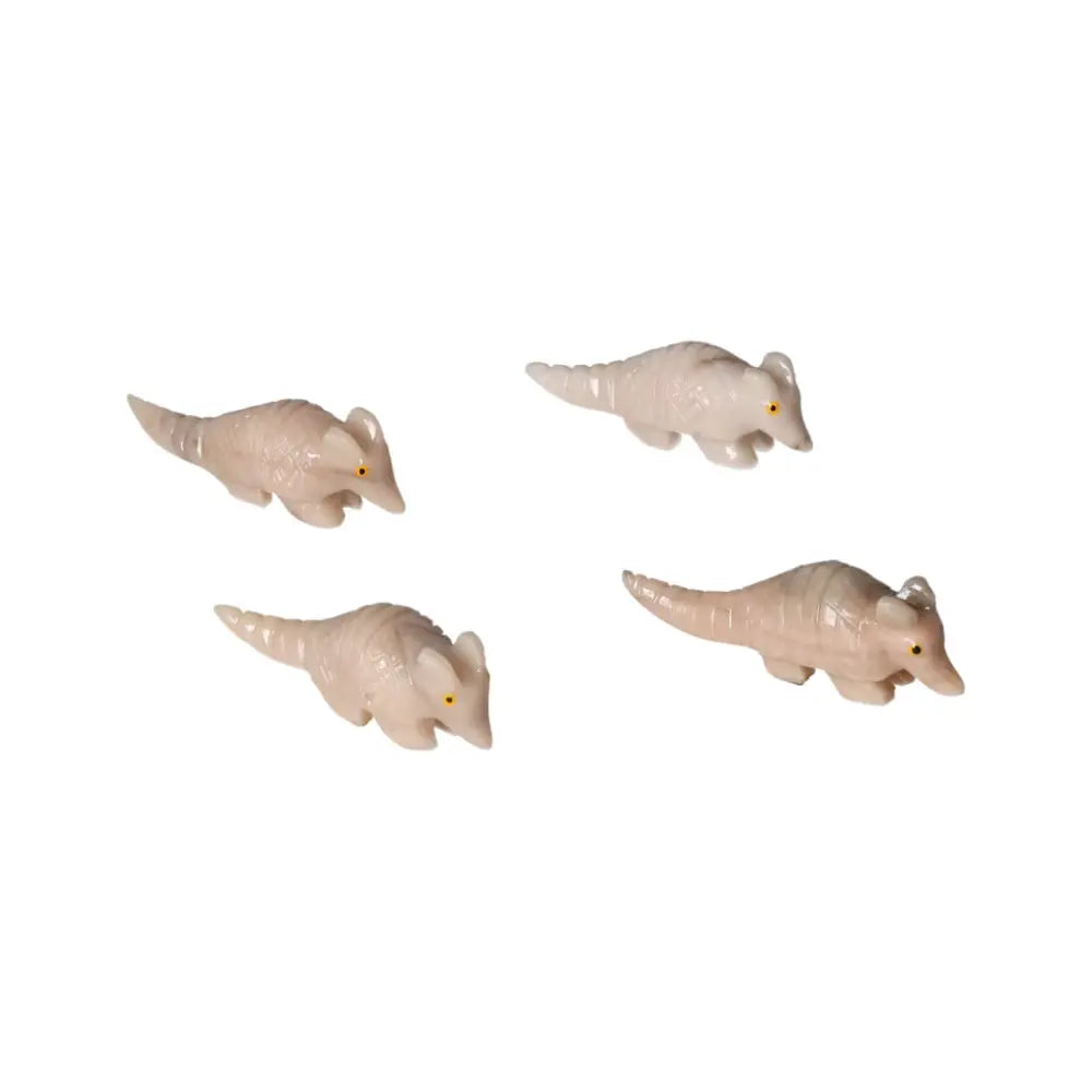 Set of Carved Dolomite Armadillos, embodying tranquility and elegance, from Sylvia Crystals' premium collection.