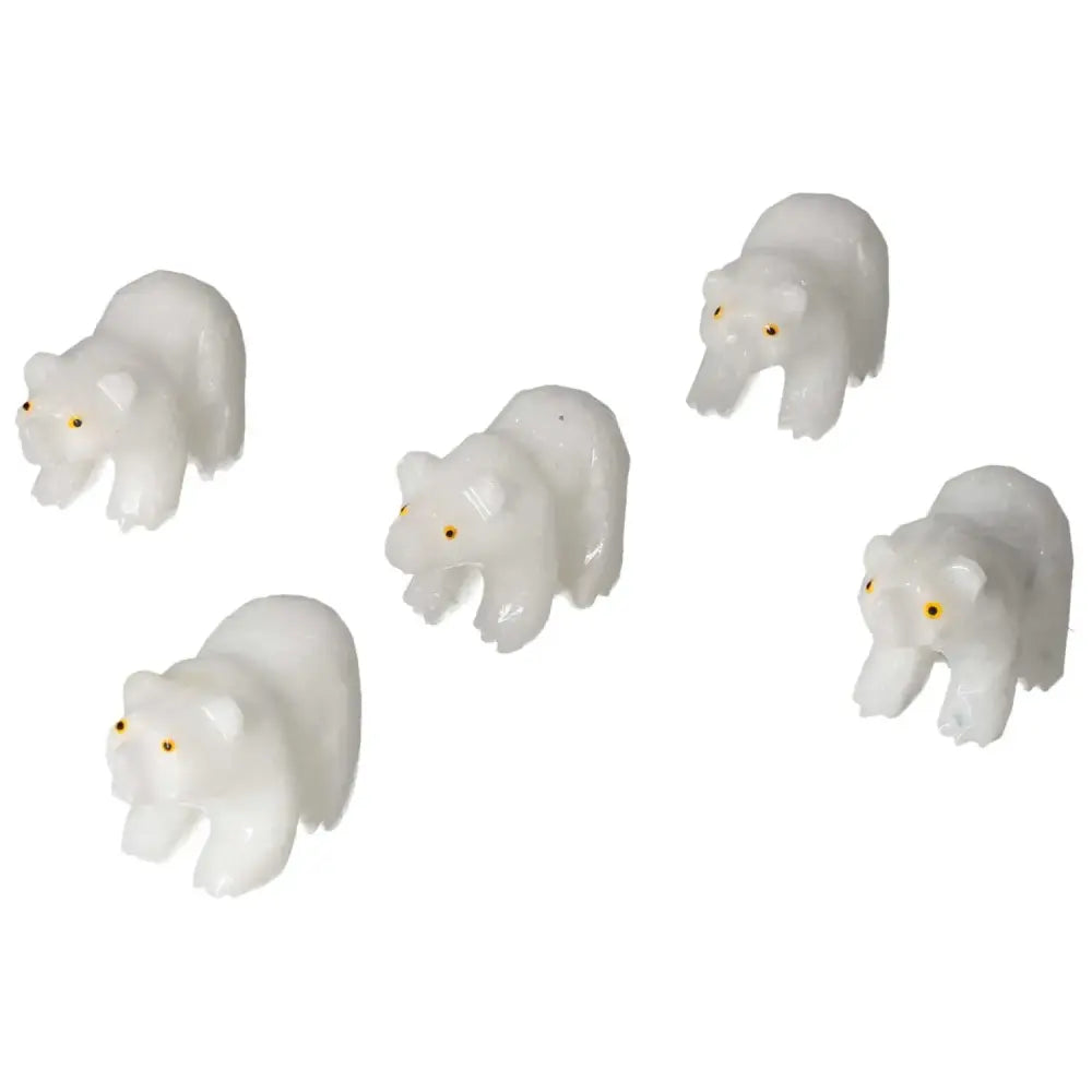 Handcrafted carved dolomite bear statues with elegant design from Sylvia Crystals, enhancing decor and promoting well-being.