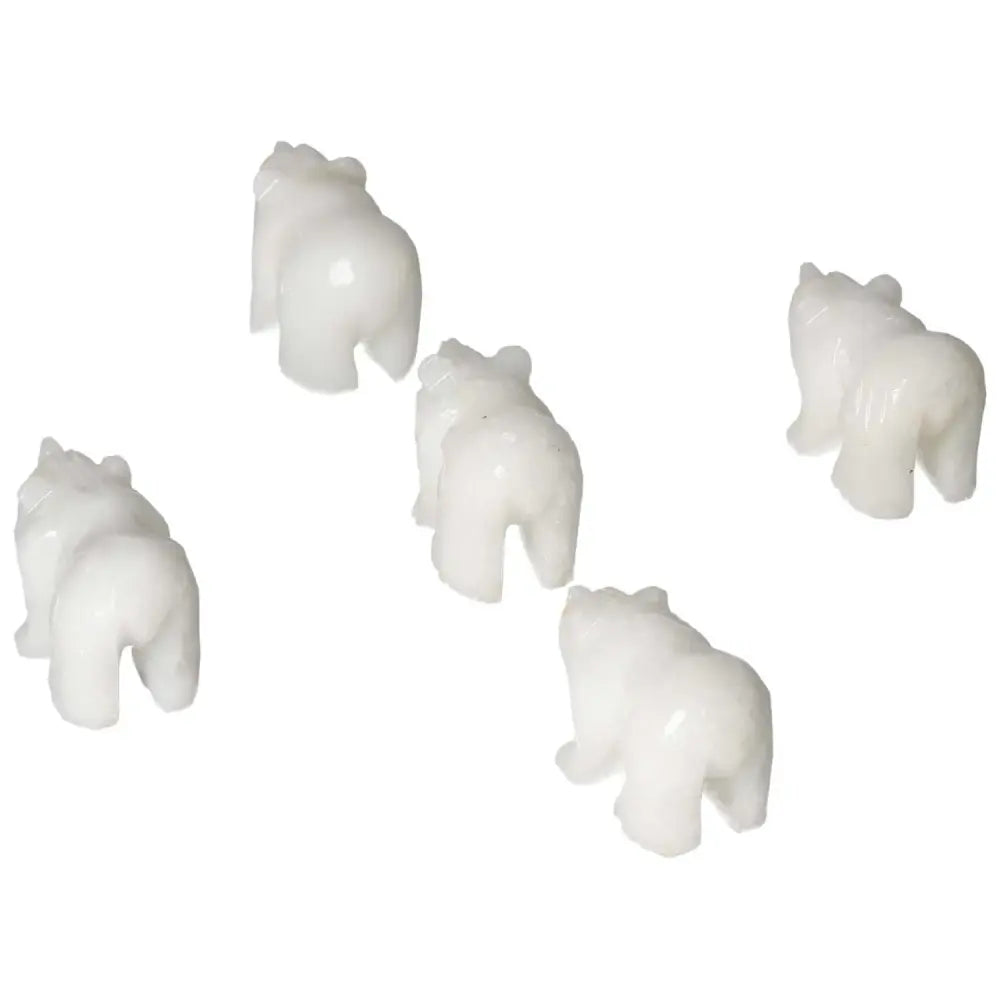 Elegant Carved Dolomite Bear sculptures by Sylvia Crystals, embodying luxury and spirituality for decor and well-being enhancement.