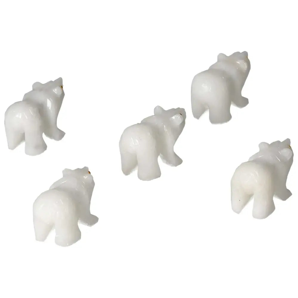 Five elegant carved dolomite bears showcasing luxury and spirituality by Sylvia Crystals.