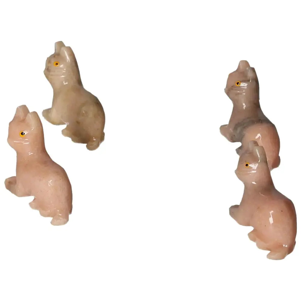 Carved dolomite cat figurines from Sylvia Crystals, showcasing tranquility and elegance, perfect for luxury decor and emotional stability.