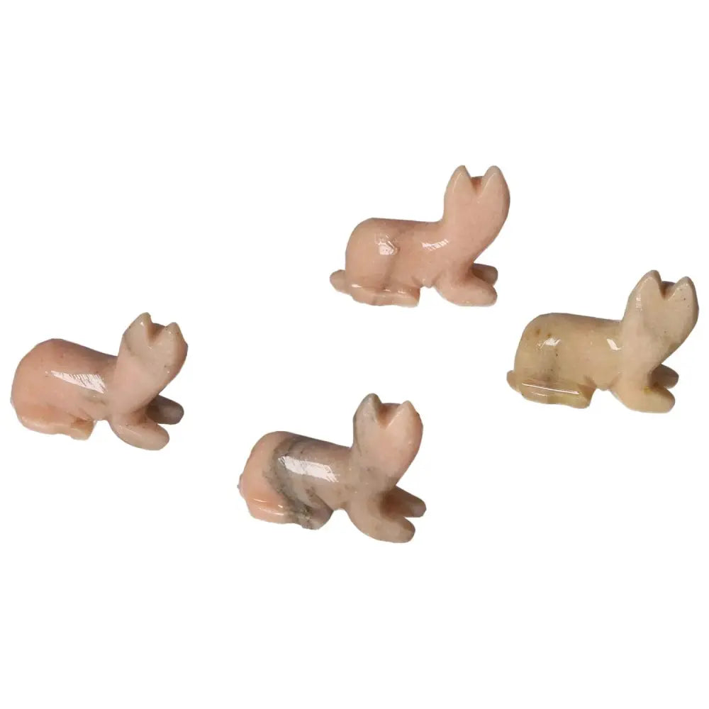 Elegant Carved Dolomite Cat figurines, from Sylvia Crystals, enhancing home decor and emotional stability. Experience luxury and tranquility.