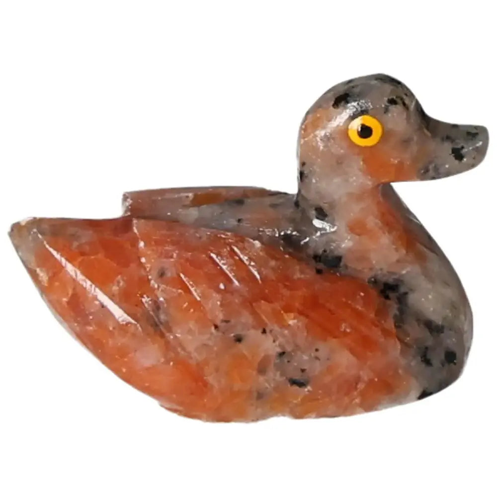 Carved Dolomite Duck from Sylvia Crystals, showcasing intricate craftsmanship and emotional grounding benefits.