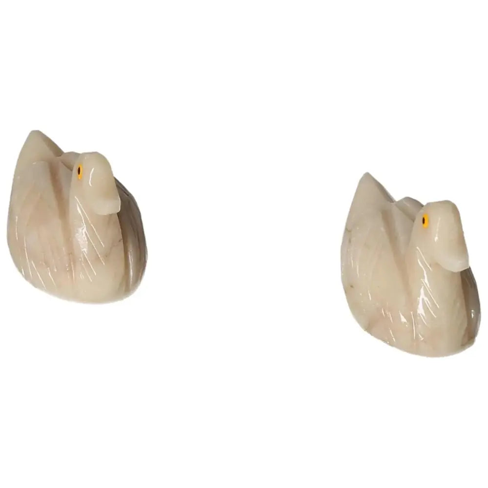 Carved Dolomite Duck by Sylvia Crystals, showcasing calming properties and unique artistry, ideal for collectors and home decor.