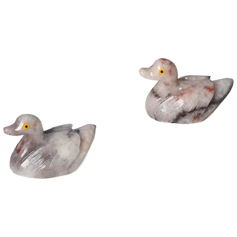 Pair of Carved Dolomite Duck statues by Sylvia Crystals, showcasing luxury and spiritual wellness with calming properties.