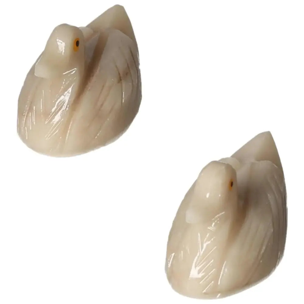 Carved Dolomite Duck by Sylvia Crystals, showcasing soothing artistic design and natural calming properties.