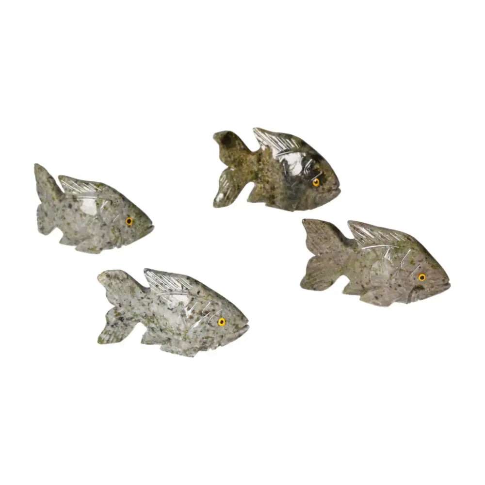 Intricately carved dolomite fish by Sylvia Crystals showcasing premium craftsmanship and spiritual luxury.