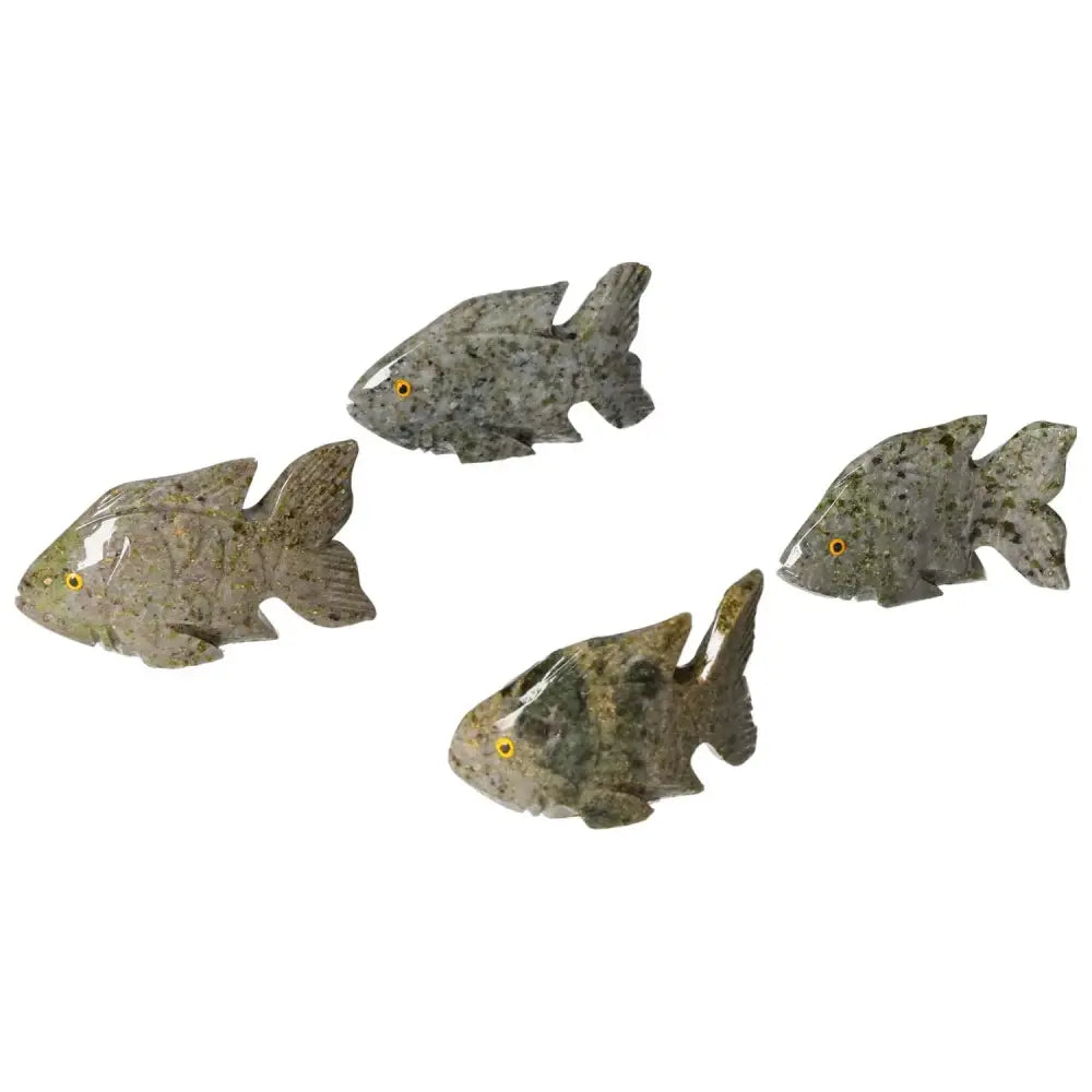 Carved Dolomite Fish sculptures showcasing intricate craftsmanship and grounding properties, perfect for emotional well-being by Sylvia Crystals.