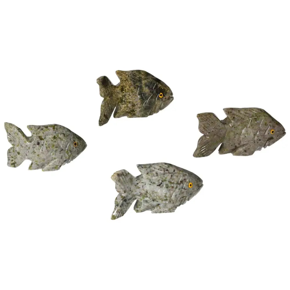 Handcrafted Carved Dolomite Fish sculptures by Sylvia Crystals, known for grounding and enhancing emotional well-being.