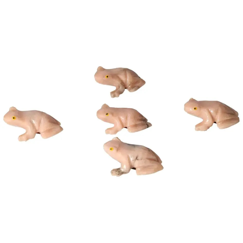 Hand-carved dolomite frog ornaments by Sylvia Crystals, symbolizing transformation and renewal with calming natural stone properties.
