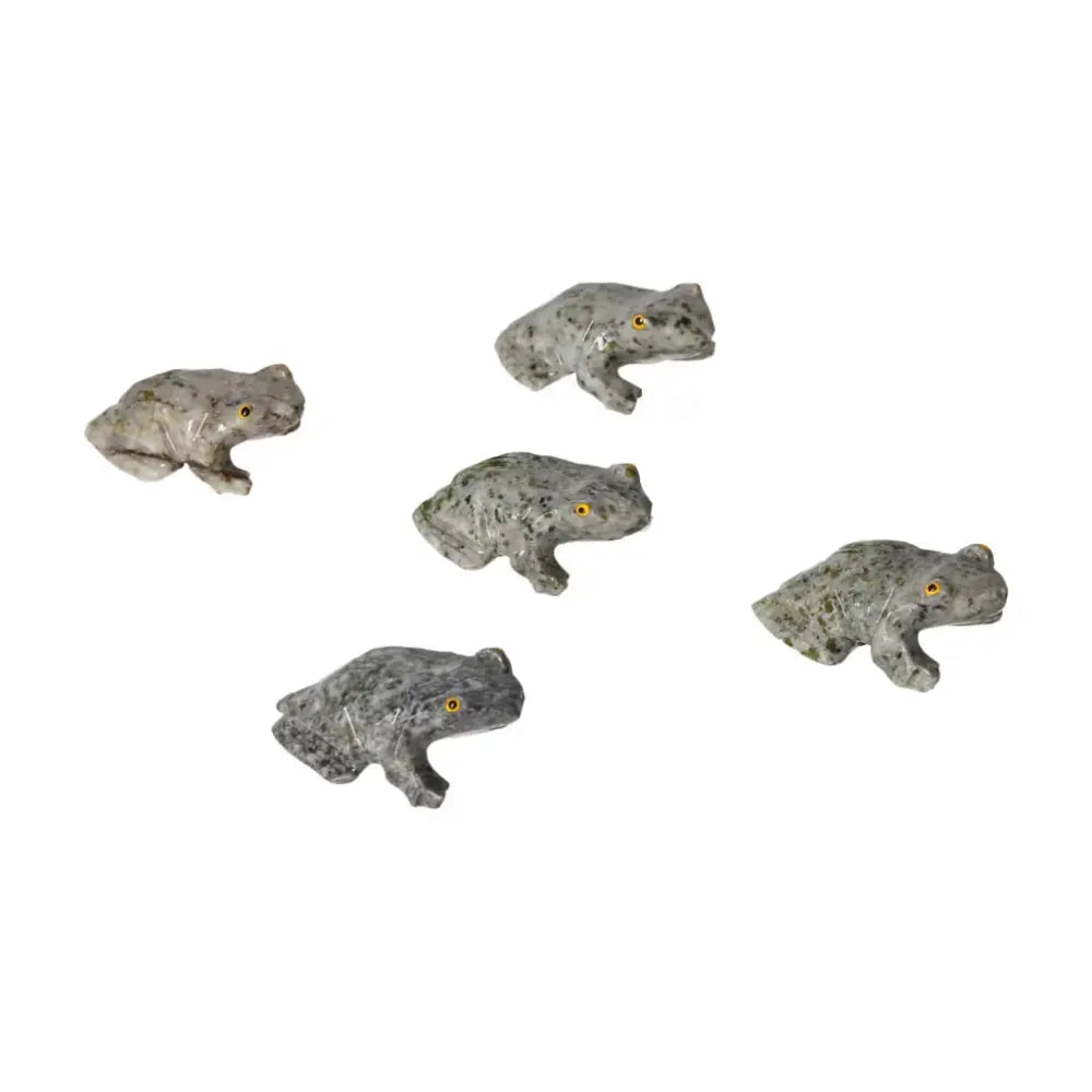 Five carved dolomite frogs by Sylvia Crystals, showcasing intricate craftsmanship and soothing qualities for emotional balance.
