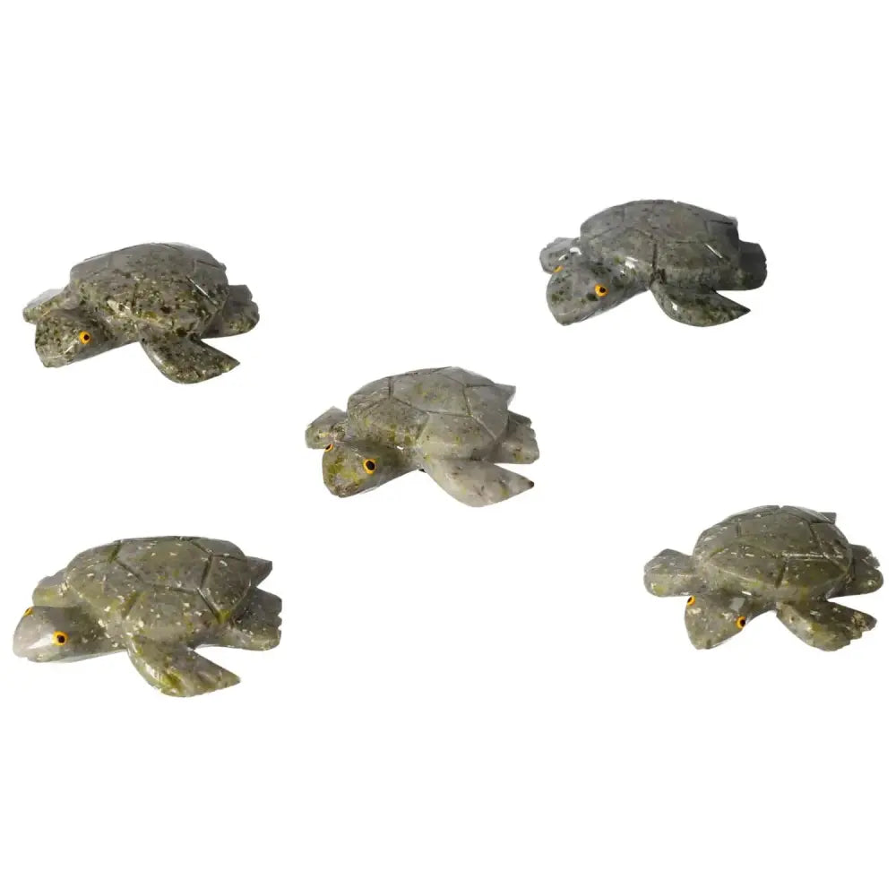 Hand-carved dolomite turtles for decor and emotional balance, showcasing natural grounding properties. From Sylvia Crystals' collection.