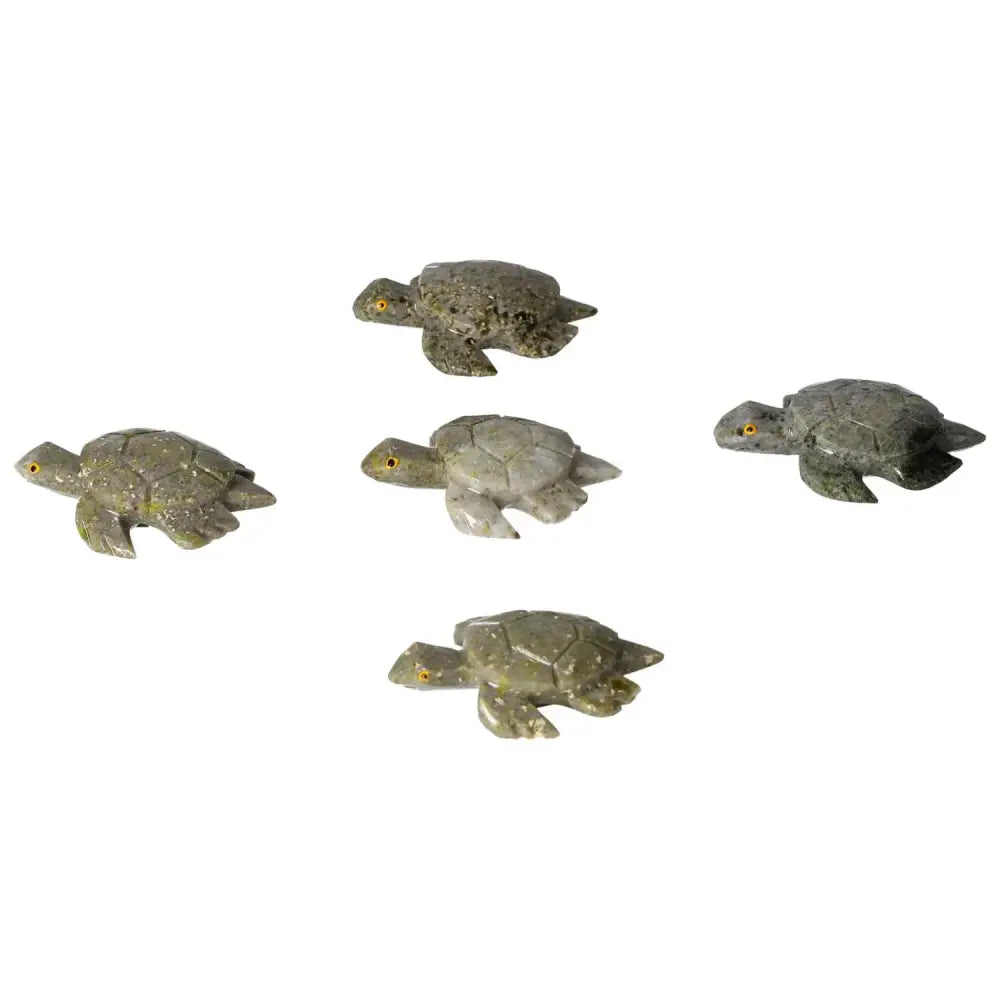 Collection of carved dolomite turtles from Sylvia Crystals, known for their calming and grounding properties, ideal for home decor.