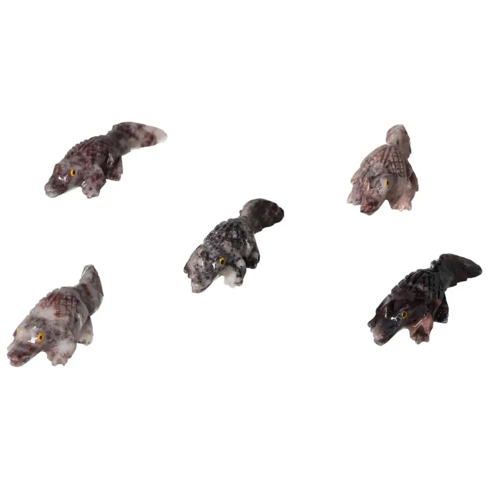 Group of carved magnesite alligator figurines, showcasing detailed artistry and spiritual enrichment by Sylvia Crystals.