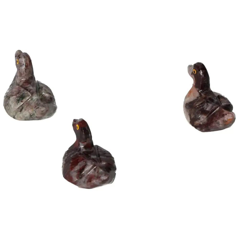 Handcrafted Carved Magnesite Duck sculptures for meditation and decor, featuring natural magnesite crystal promoting serenity.