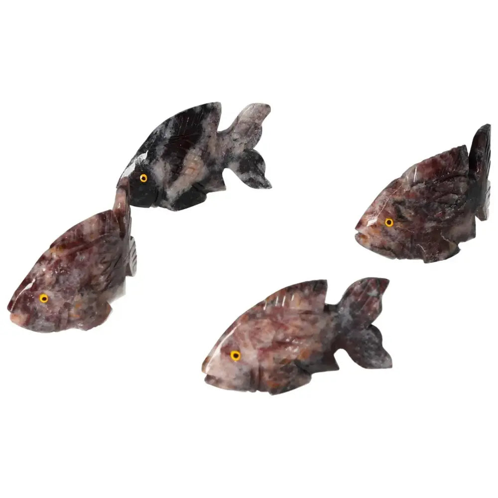 Carved Magnesite Fish for tranquility and meditation by Sylvia Crystals, enhancing creativity and peace in any setting.