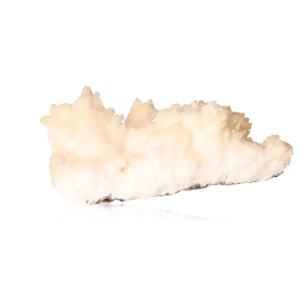 Cave calcite stalactite cluster with intricate white formations showcasing natural beauty and growth.