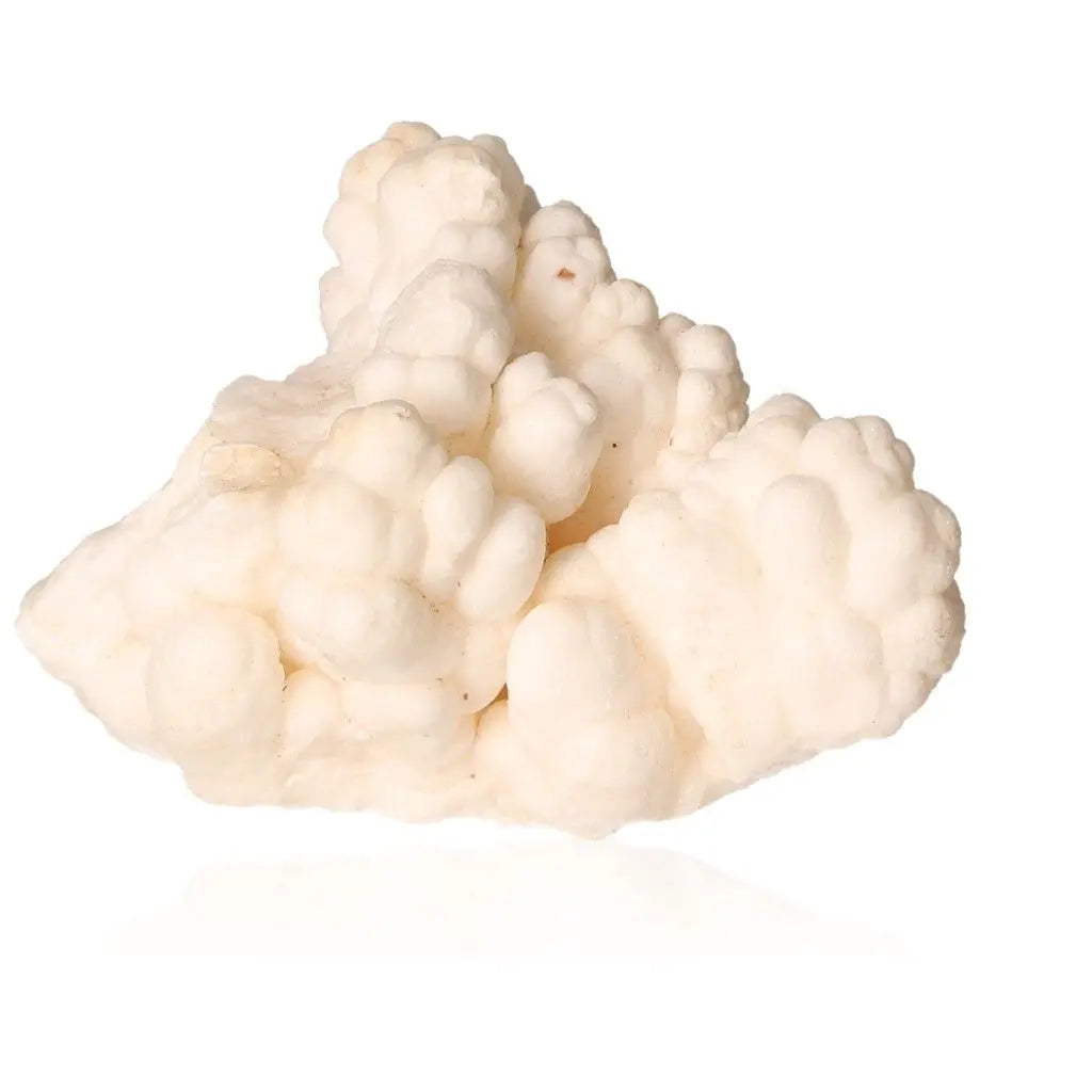 Natural cave calcite stalactite cluster showcasing intricate shapes and layered textures, representing nature’s craftsmanship and growth.