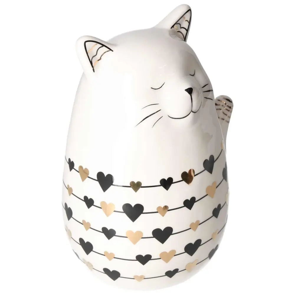 Elegant ceramic cat decoration with heart patterns embodying harmony and luxury, inspired by Sylvia Crystals' philosophy of conscious living.