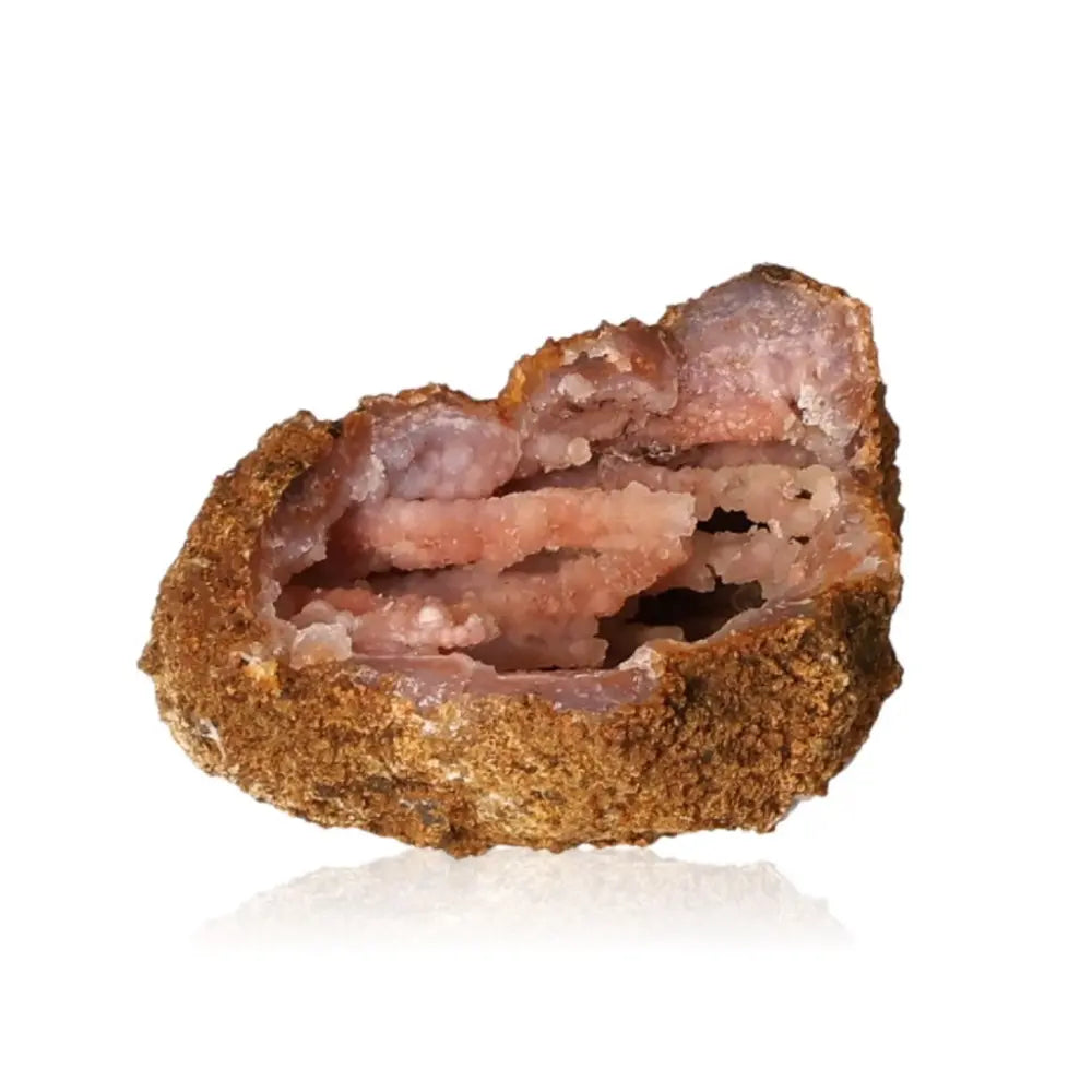 Chalcedony Stalactite crystal showcasing natural structures, symbolizing growth and balance in a spiritual journey, by Sylvia Crystals.