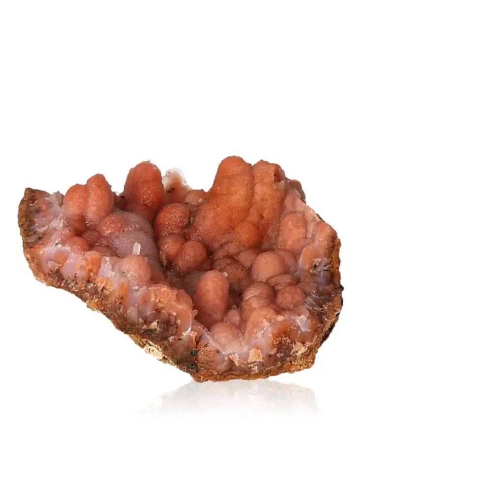 Chalcedony Stalactite crystal with unique textures and orange hues, ideal for spiritual growth and elegance from Sylvia Crystals.