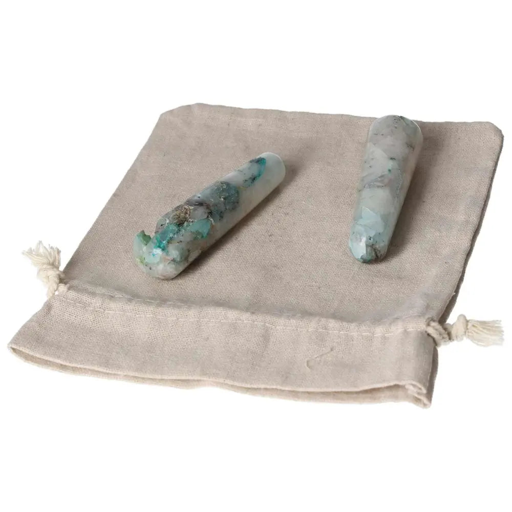 Chrysocolla wands on linen pouch, enhancing communication and empowering feminine energy for clarity and emotional understanding.