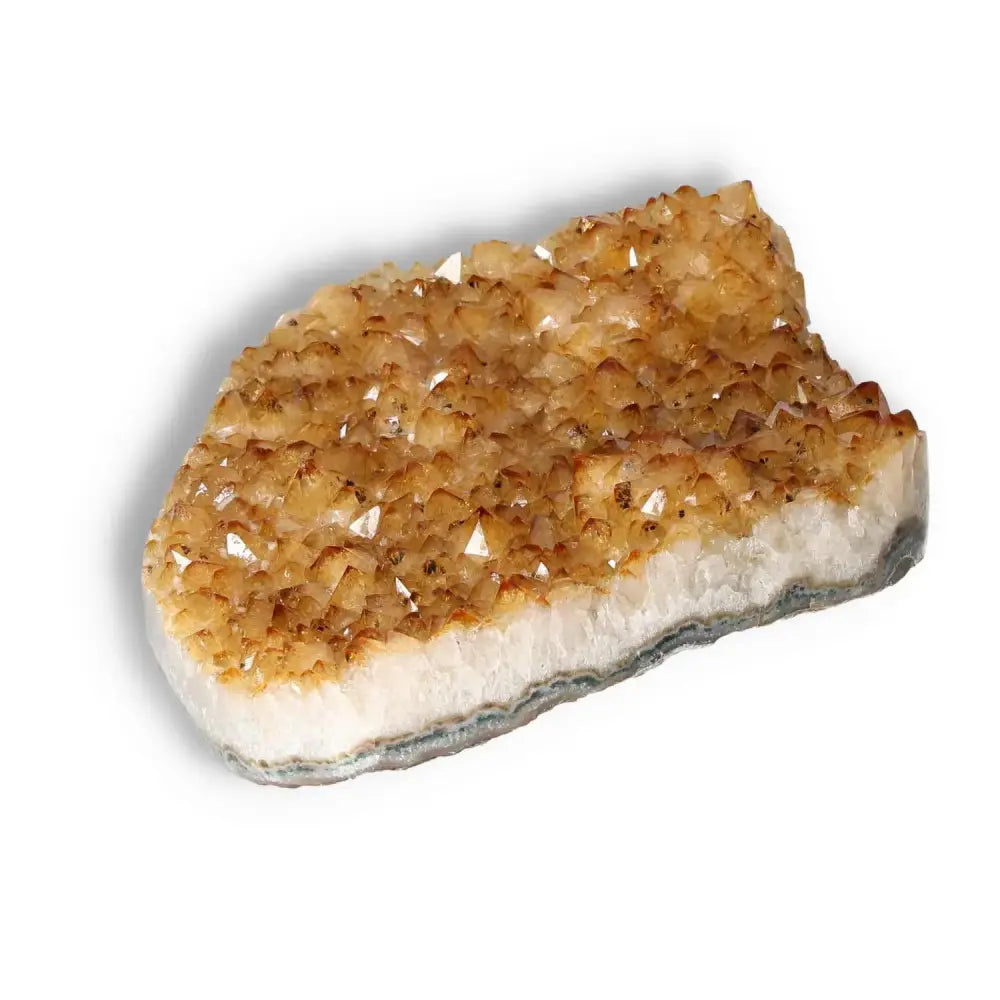 Citrine Druze crystal from Sylvia Crystals, showcasing vibrant yellow hues, symbolizing positivity and abundance.