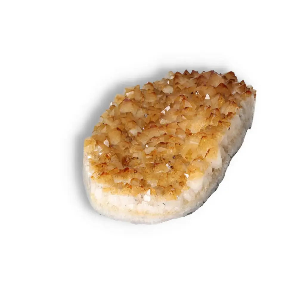 Citrine Druze stone by Sylvia Crystals, known for elegance and inspiration, capturing energy and supporting new ventures.