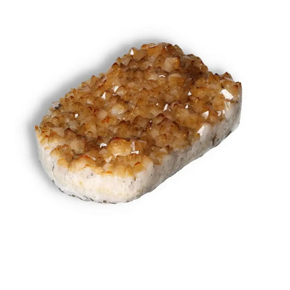 Citrine Druze crystal from Sylvia Crystals, known for inspiring new ventures and enhancing positive energy, featuring vibrant golden hues.