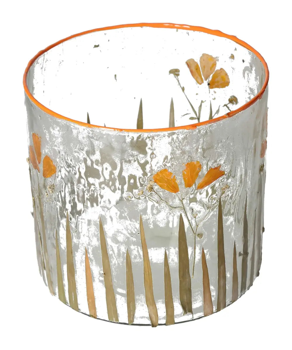 Clear candle holder with orange dried flower motifs, translucent design featuring intricate floral decoration.