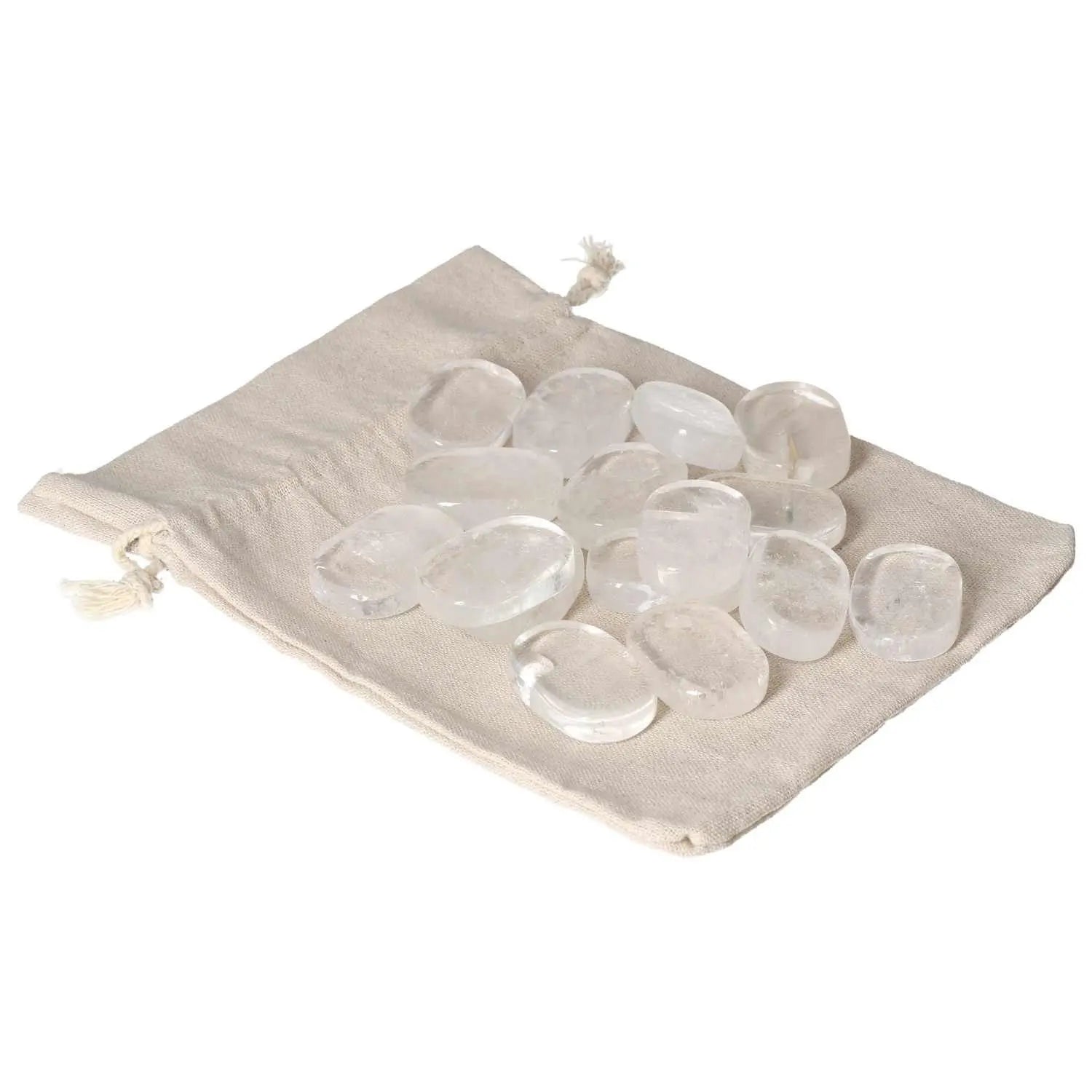 Clear quartz thumb massagers from Sylvia Crystals on a beige pouch, promoting stress relief and energy harmonization.