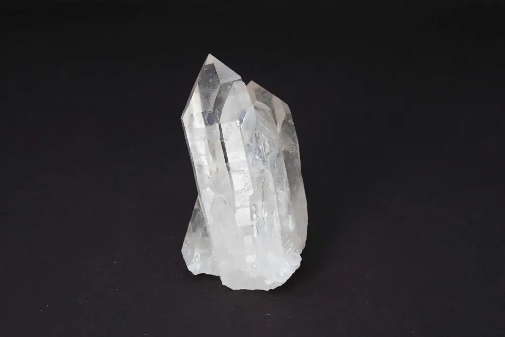 Clear Quartz Cluster displaying multiple crystal points on a shared matrix, radiating pure energy and high vibrational clarity.