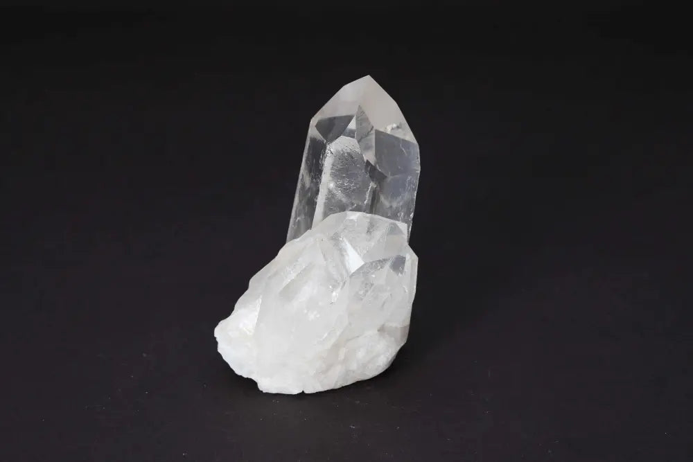 Clear Quartz Cluster - Amplifies intention with pure energy and clarity, featuring multiple crystal points on a shared matrix.
