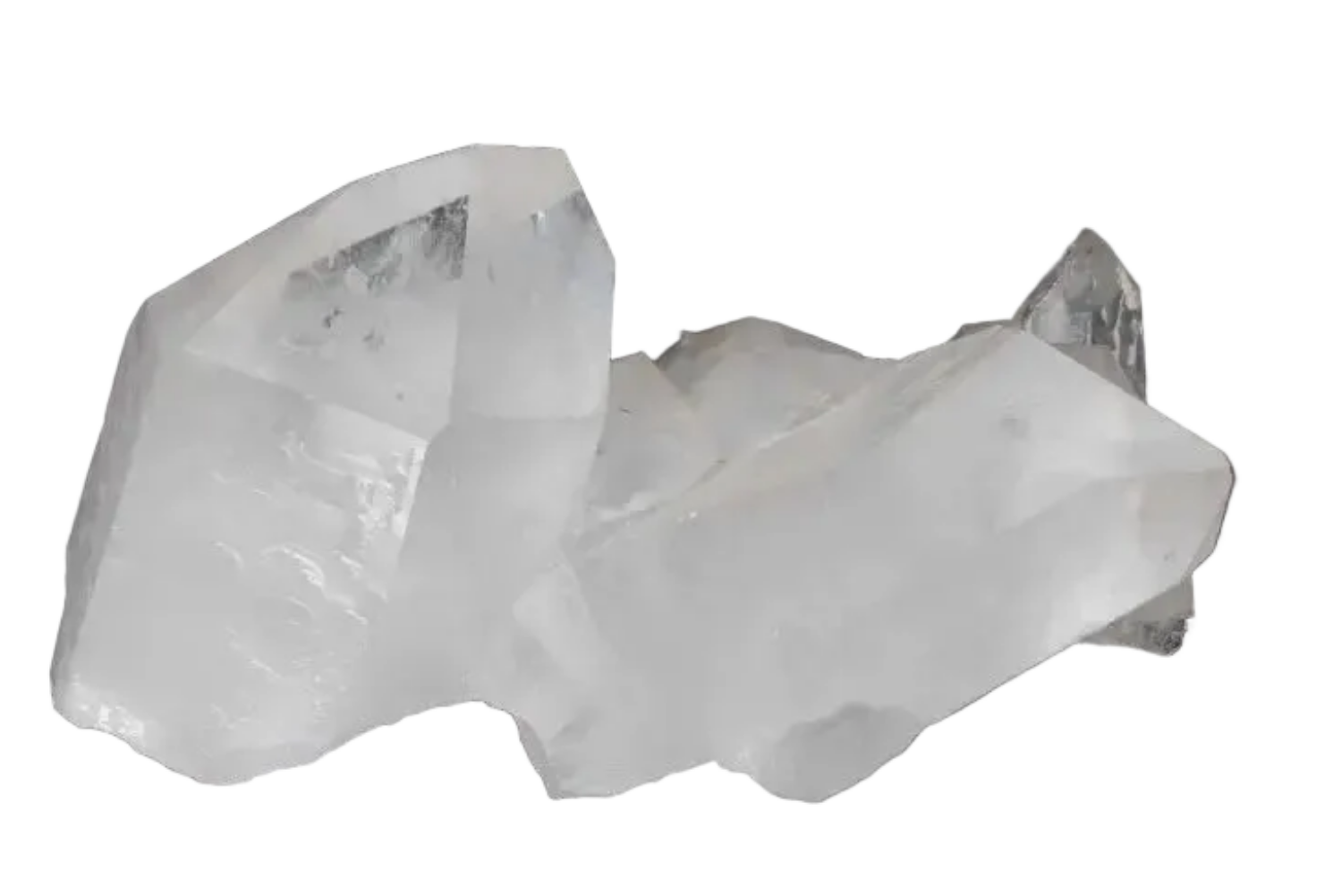 Clear quartz cluster on dark background, showcasing multiple crystal points forming a natural formation for energy amplification and purification.