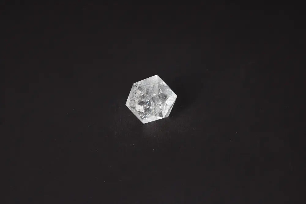 Clear Quartz Geometric Sphere 3 cm, harmonizing stone absorbing negative vibrations, ideal for cleansing energy and space.