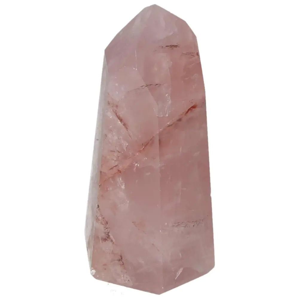 Rose quartz crystal tower with subtle pink hues against a white background, showcasing natural beauty and healing properties.